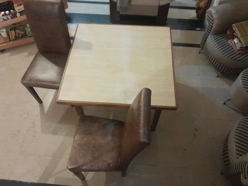 Pure wood dining table with two chairs. 4