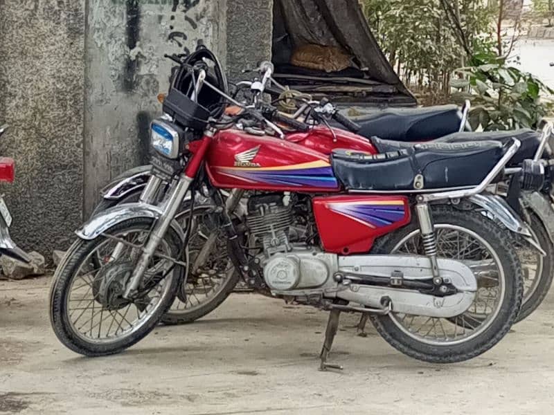 honda 125 2010 islamabad number 7