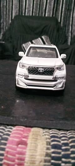 Toyota Land cruiser Prado TX white colour model toy car