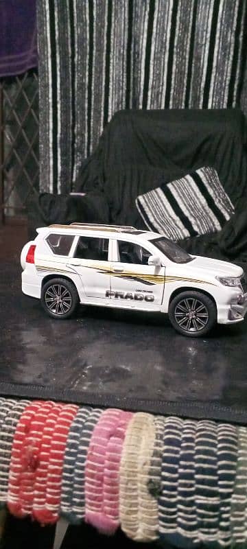 Toyota Land cruiser Prado TX white colour model toy car 1