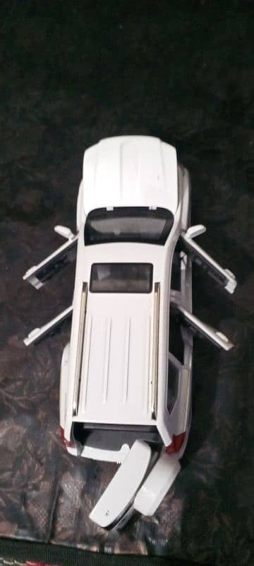 Toyota Land cruiser Prado TX white colour model toy car 4