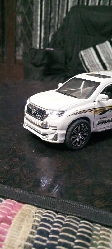 Toyota Land cruiser Prado TX white colour model toy car 7