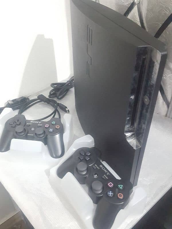 ps3 500gb 50 games installed with 2 remotes wirelles 10