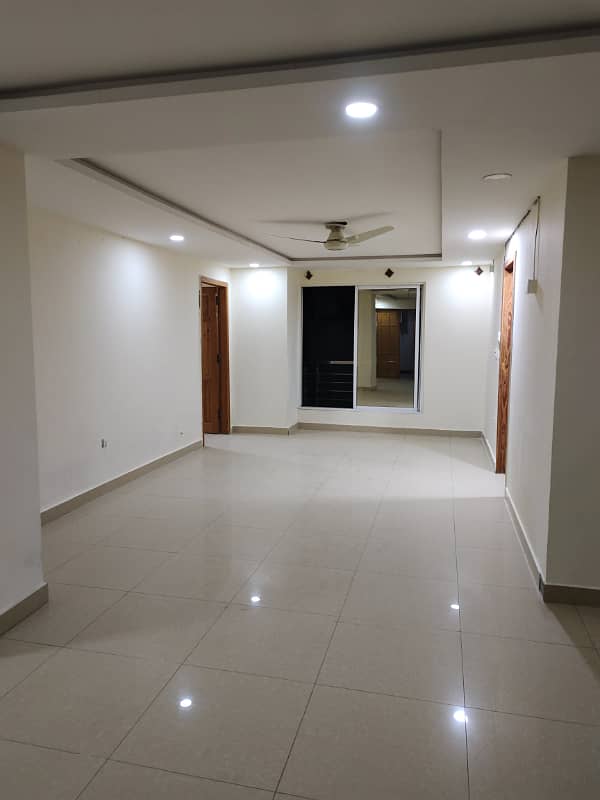 Beautiful luxury apartment available for sale in F-11 Islamabad at maine road, 3 bedrooms with bathrooms, drawing, dining, a Big TVL, servant quarter with bathroom and separate car porch, on reasonable price, 2