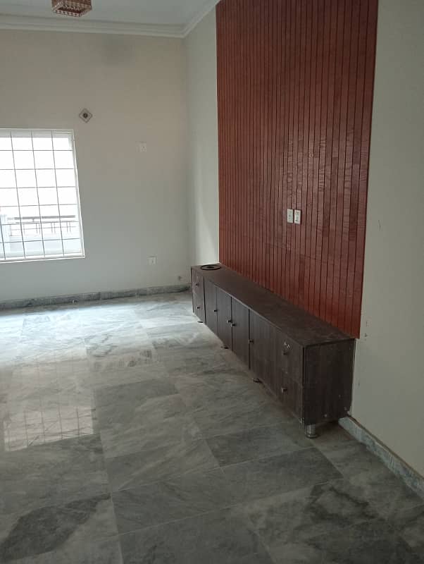 20marla 3beds DD TV lounge kitchen attached baths neat clean ground portion for rent in G 14 3 islamabad 6