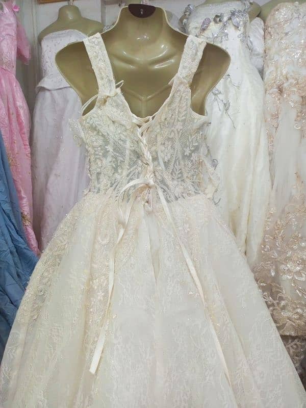 Elegant Lace Wedding Dress with Beaded Details 4