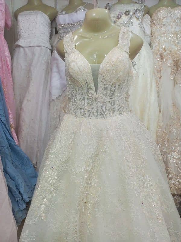 Elegant Lace Wedding Dress with Beaded Details 8