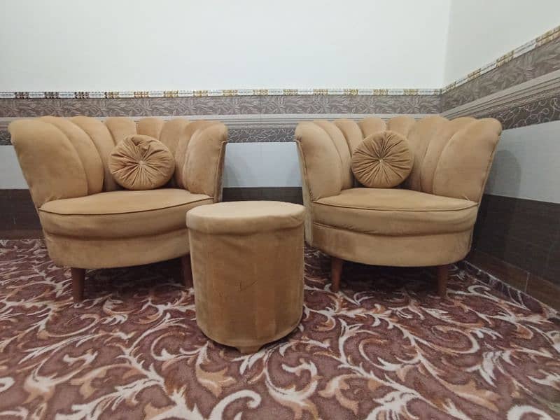 Two seater crowned shape brown colour sofa with free center table 5