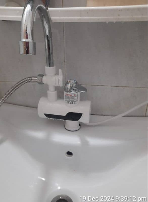 Electric instant water heater faucet with Shower. 1