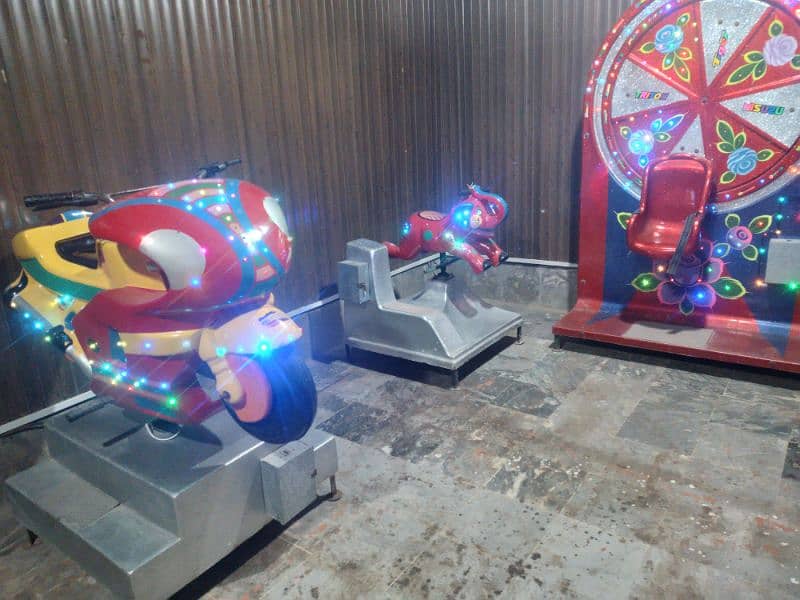 Kids token rides swings joyland funland electric ride 2