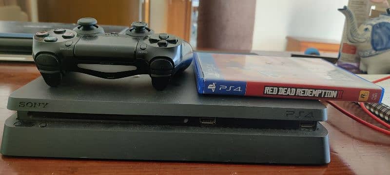 PS4 Slim 100% condition with Original Controller + RDR2 1