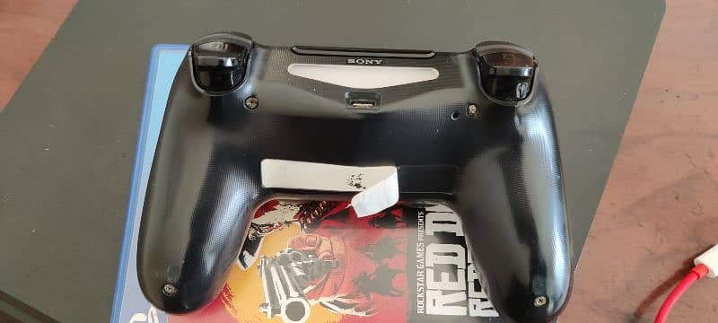 PS4 Slim 100% condition with Original Controller + RDR2 3