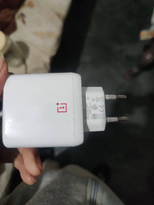 OnePlus 7t with charger  exchange posible 5