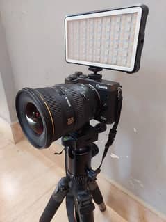 Canon mirrorless m6 with lens, stand, rgb light, mic and lens mount