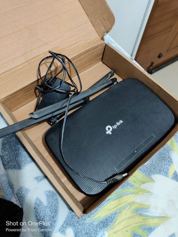 New , slightly used TP link Router 1