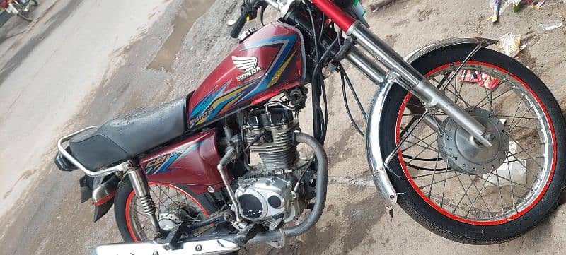 honda 125 red colour 1