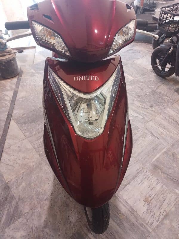 united 100cc petrol scooty 2019 0