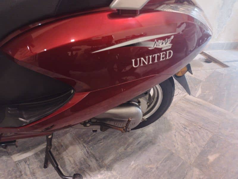 united 100cc petrol scooty 2019 1