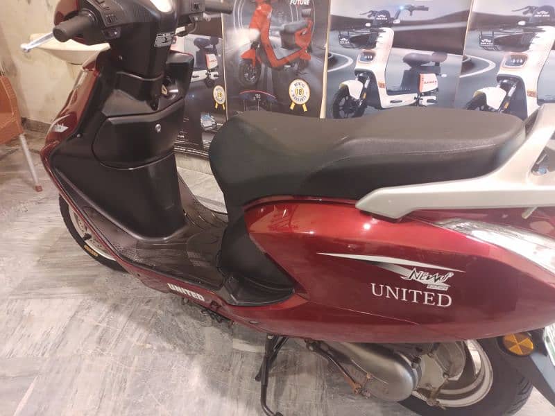 united 100cc petrol scooty 2019 8