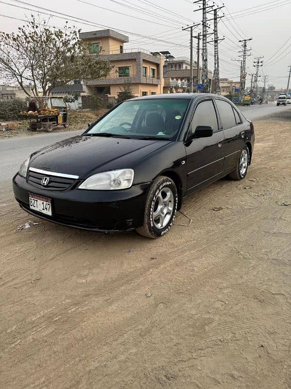 Honda civic for rent 2003 model with driver 1