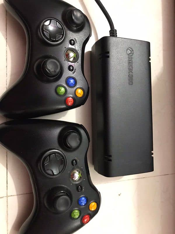 selling Xbox 360 slim two consoles with 2 kinetic. 1