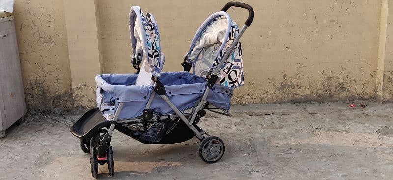 Baby Pram Two Seater. . . 1