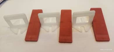 Tiles spacers clip and wedge