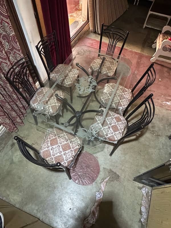 6 chairs dining table (heavy glass) 0