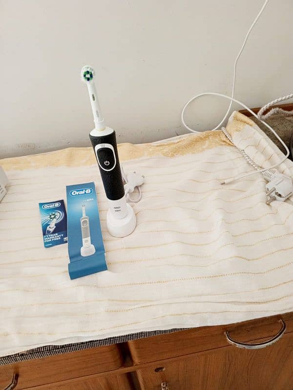 oral B virility 100 rechargeable electronic toothbrush 4