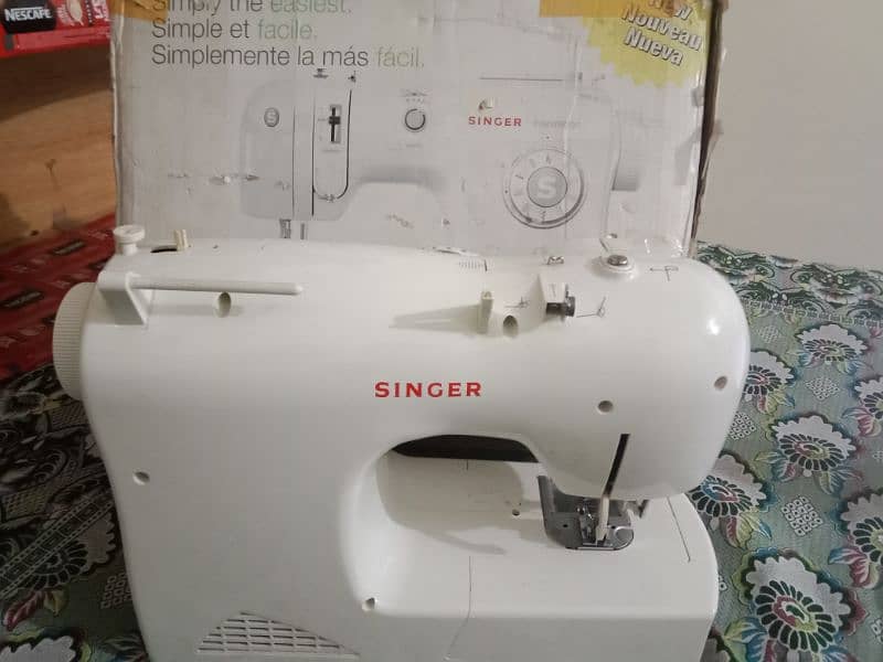 Automatic Singer sweeing Overlocking Machine 1