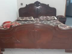 Double bed made of wood ,polished