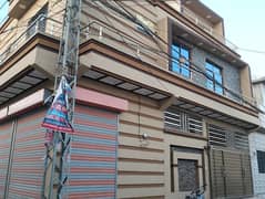 Spacious 6 Marla Double House With 4 Shops Available For Sale In Asim Qadri Block