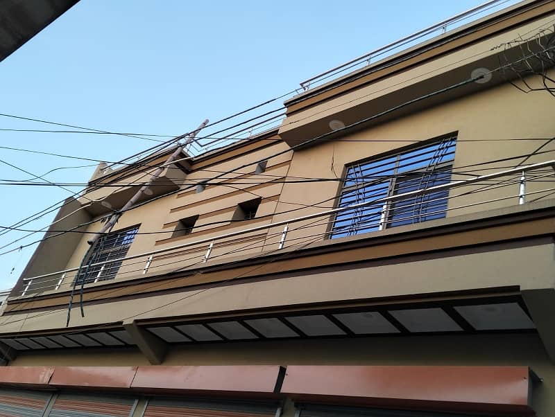 Spacious 6 Marla Double House With 4 Shops Available For Sale In Asim Qadri Block 49