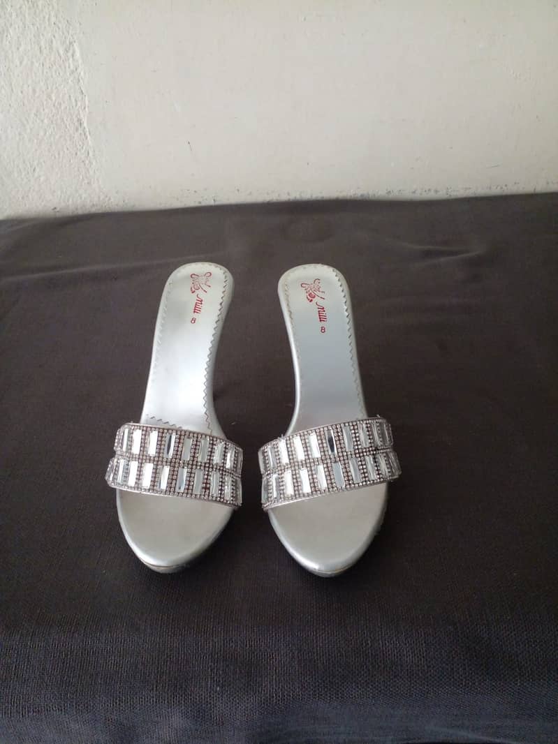 Silver colour heel for girls 0