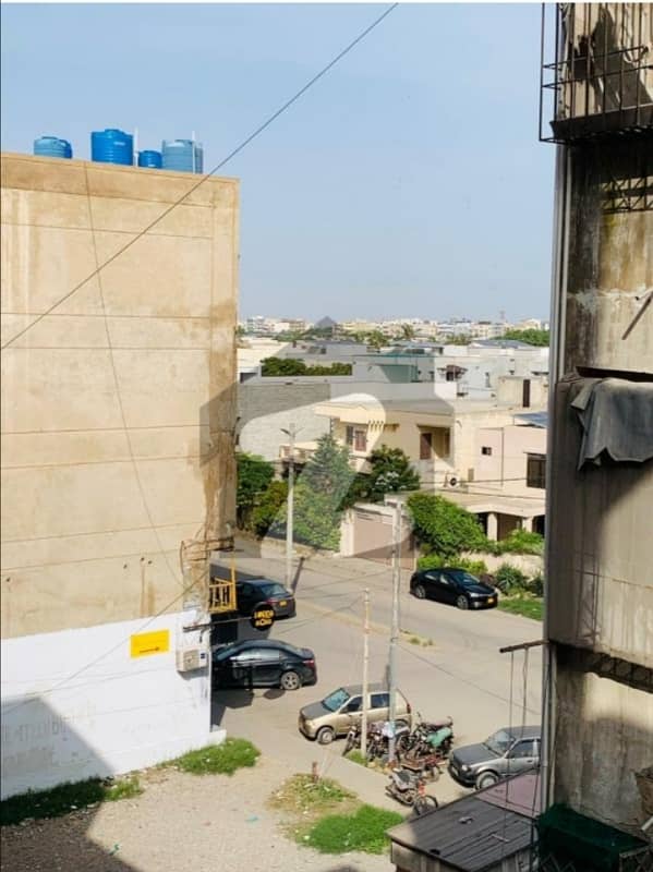 VIP location of DHA phase V main khbe a Bader next to Bungalow facing 2 BDD apartment Both side entrance 3rd floor with Rooftop fully family building Sale demand 77 lac's 2