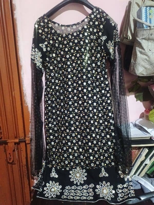 black shirt with golden stars work with long net stylish sleeves 0