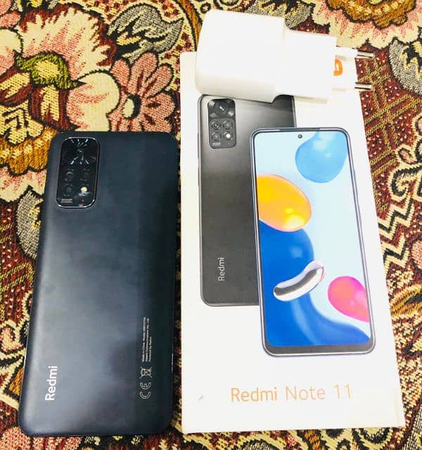 Redmi note 11 with box and charger 1