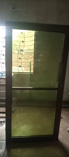 aluminium door with green glass