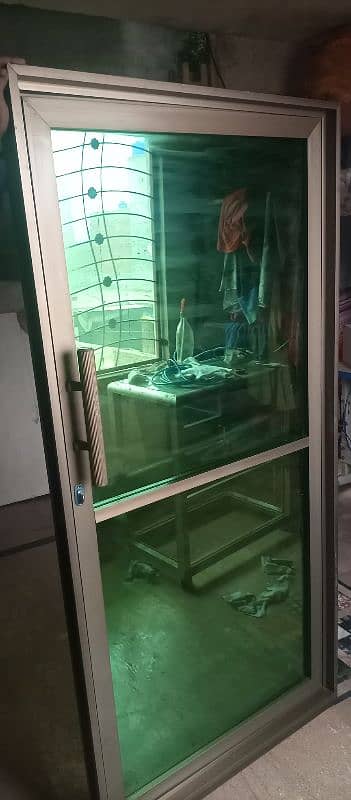 aluminium door with green glass 1