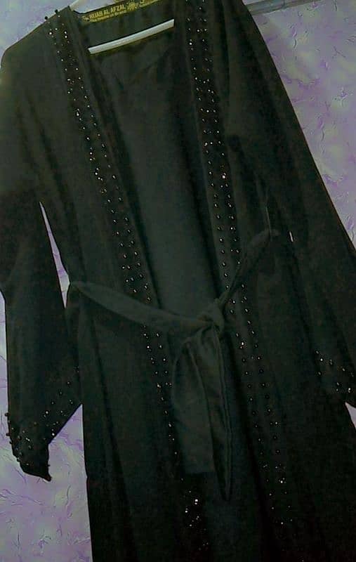 selling few times used abaya 1