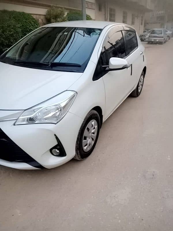 TOYOTA VITZ PEARL WHITE TOP OF THE LINE 7