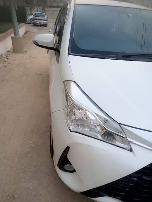 TOYOTA VITZ PEARL WHITE TOP OF THE LINE 12