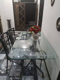 Glass top dining table with 4 chairs