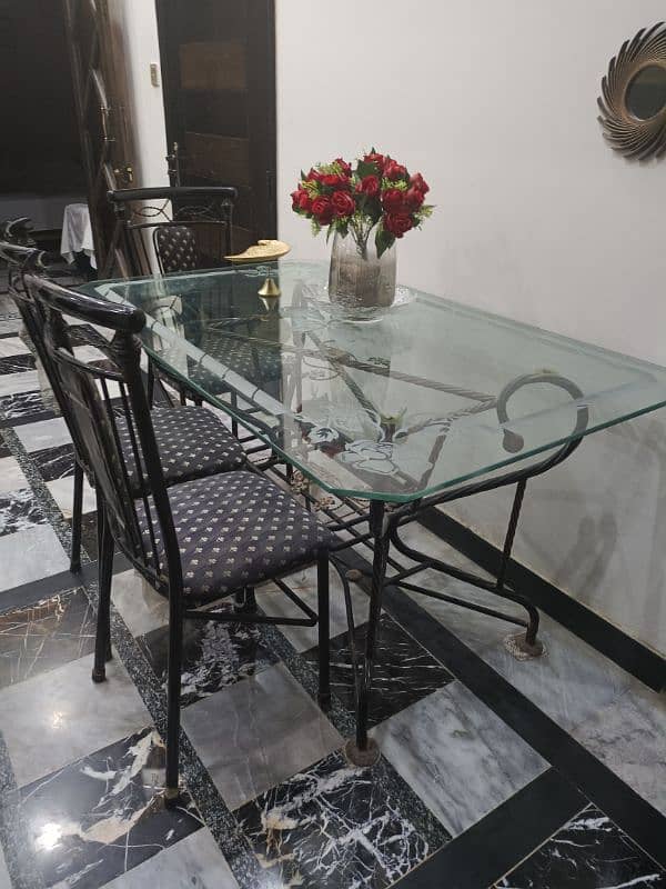 Glass top dining table with 4 chairs 4