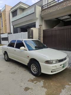 Mitsubishi Lancer 1992 in best condition is urgent for sale