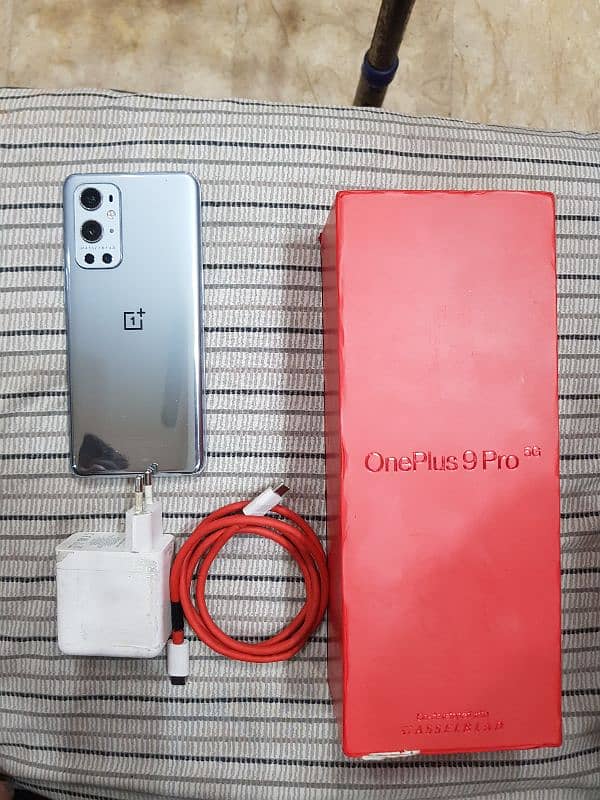 One plus 9pro5g 12 /256gp condition all okay box and charging ha PTA 5