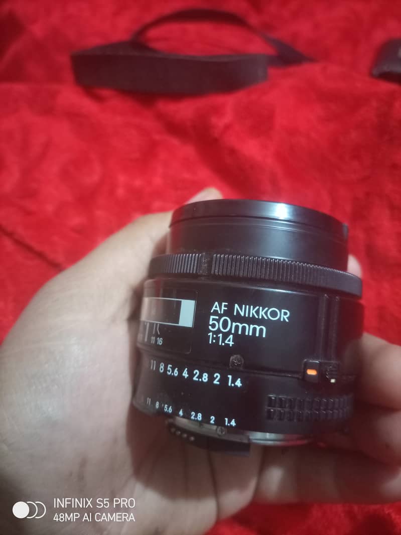 Nikon  AF 50 mm 1:1.4  lens in brand new condition 1