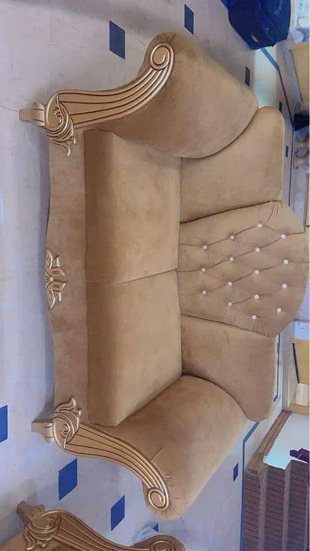 7 seater sofa with centre table golden colour 0