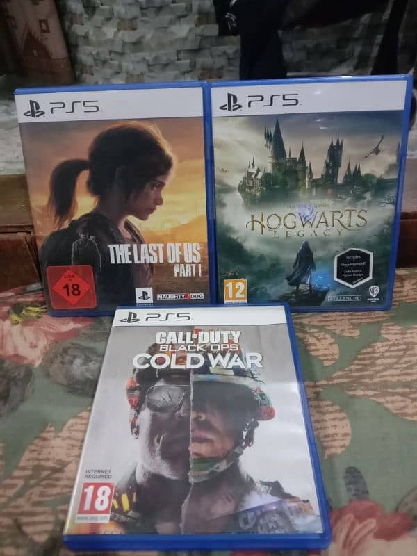 The Last of Us Part 1, Hogwarts Legacy,Call of Duty Black Cold War Ps5 0