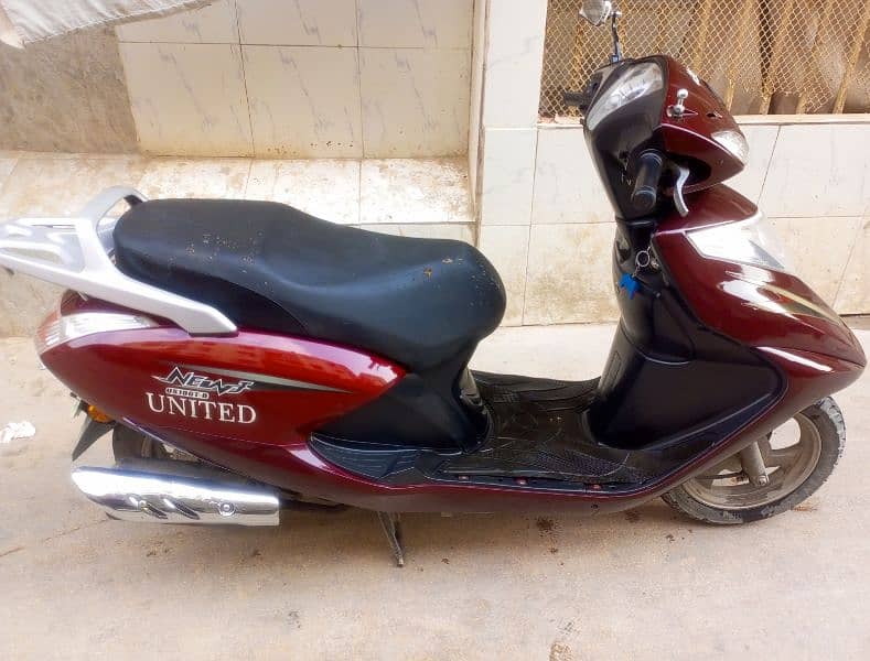 United scooty 100 cc  WhatsApp 03132609168 0